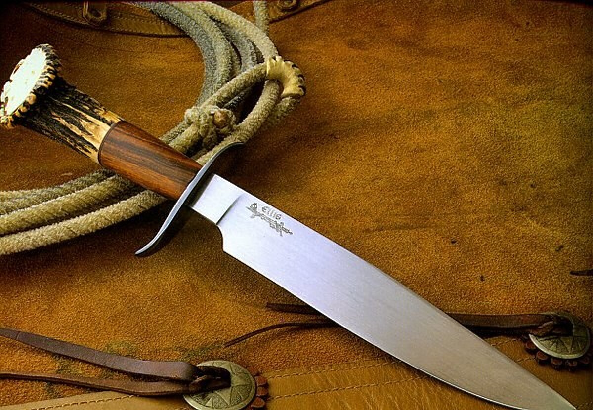 10-inch bowie knife hand-forged by Dave Ellis, ABS Mastersmith, on tooled leather